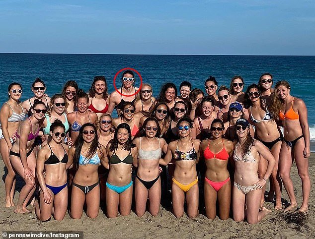 UPenn women's swimmers and divers relax on the beach in January 2020. Lia Thomas is circled