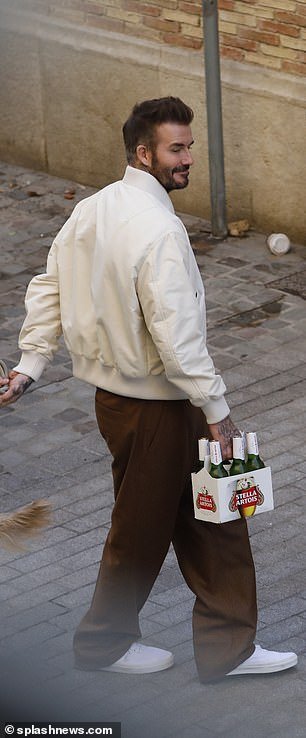 Dressed in a trendy cream bomber jacket from Italian label Loro Piano, priced at an eye-watering £4,135, paired with brown trousers, he filmed the advert in the Catalan city's chic Born district.