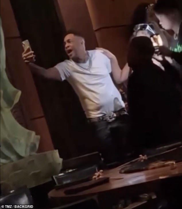 Brown was seen holding his iPhone and recording the interactions in the clip