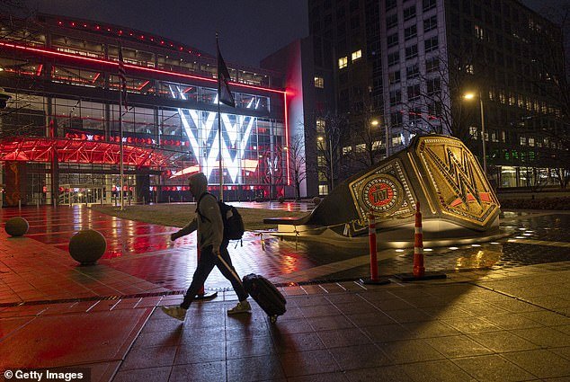 The WWE logo shines from the WWE World Headquarters in Stamford, Connecticut on January 28