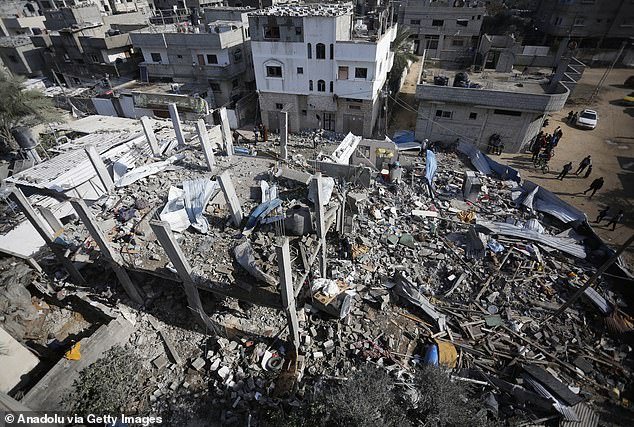 An aerial view of destroyed buildings as a result of the Israeli attack on the Nuseirat refugee camp, in Deir al-Balah, Gaza, on January 26