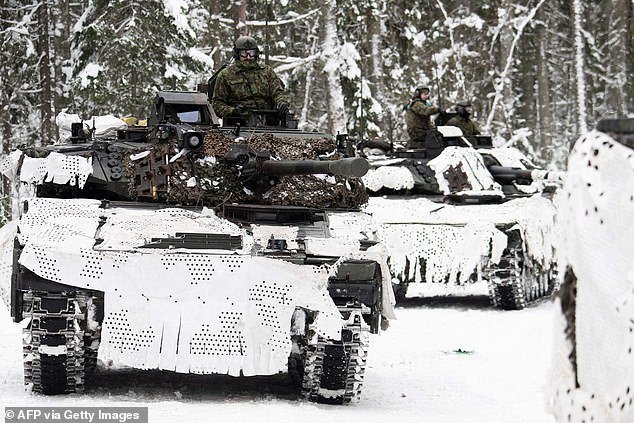 NATO plans to mobilize 90,000 troops in its biggest military maneuver since the Cold War in a bid to deter Vladimir Putin.  Pictured: British soldiers take part in a major exercise as part of the EFP NATO operation at the Estonian army camp Tapa near Rakvere, on February 6, 2022