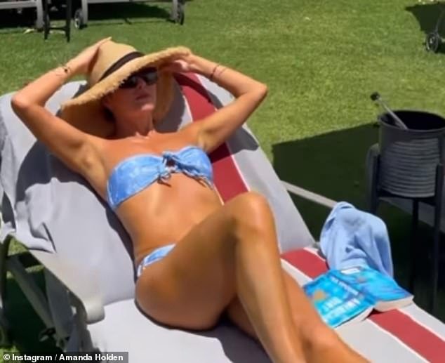 Taking to Instagram, the 52-year-old presenter gave fans a glimpse of her getaway as she posed in a tiny two-piece at a tropical resort