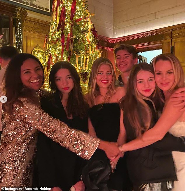 The Britain's Got Talent judge shared a fun gallery of Instagram photos documenting the night out, alongside her daughters Lexi, 17, Hollie, 11, and a group of their friends