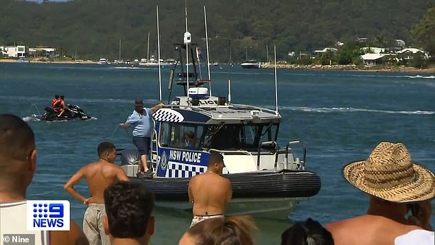 A father in his 30s drowned in the presence of his eight-year-old son at Ettalong Beach on the NSW central coast on Saturday afternoon