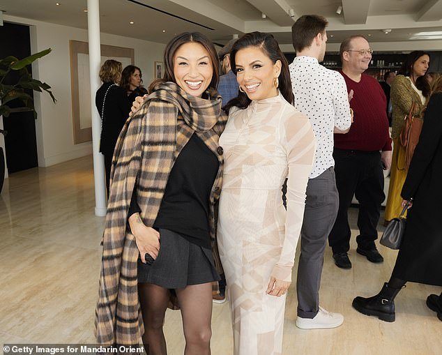 They were also joined at the event by Jeannie Mai, as seen in a photo of her posing next to Longoria.  The television personality, 45, wore a simple black top and gray skort, but bundled up in a flannel fleece poncho coat