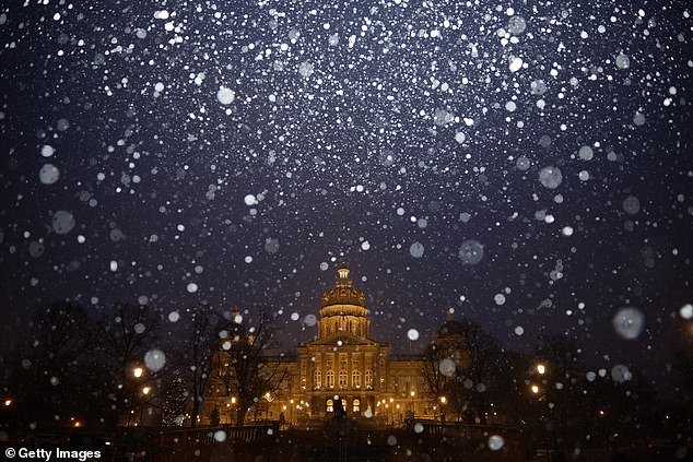 Snow will fall in the Iowa state capital of Des Moines on Monday evening.  Heavy snow has disrupted presidential campaigns and more frigid weather is forecast for the coming week