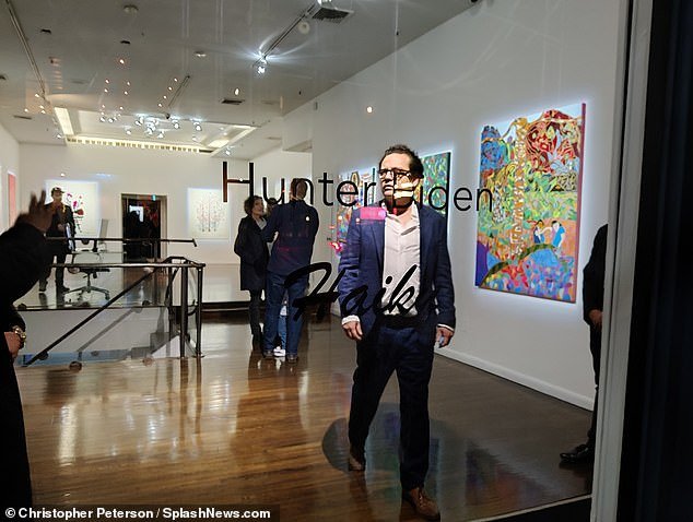 Georges Bergès stands in his gallery in New York City during Biden's gallery exhibition