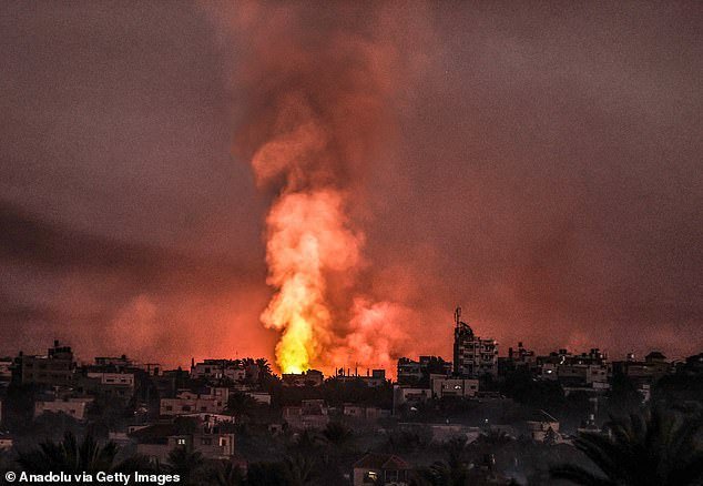 Smoke and flames rise from several parts of Salah al-Din Road following Israeli attacks in Deir Al Balah, Gaza on January 7, 2024
