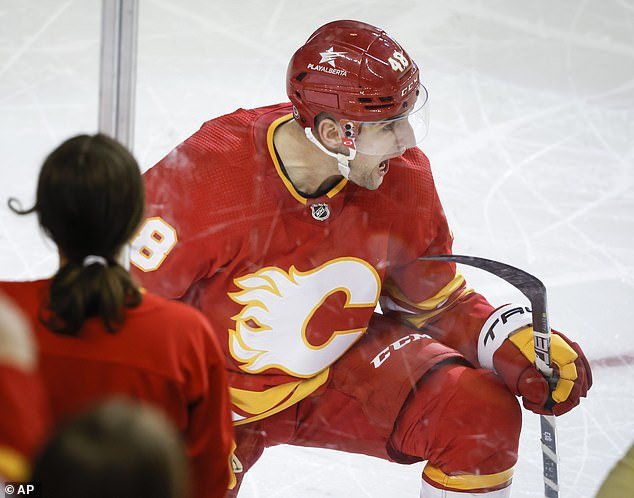 Dennis Gilbert hit his head on the ice during the Flames' win over the Nashville Predators