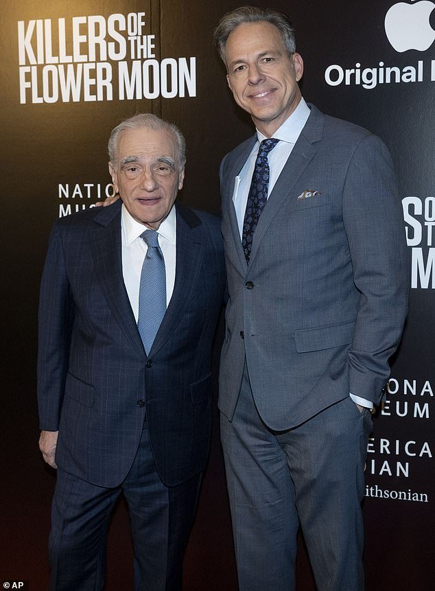 The renowned director posed with journalist Jake Tapper
