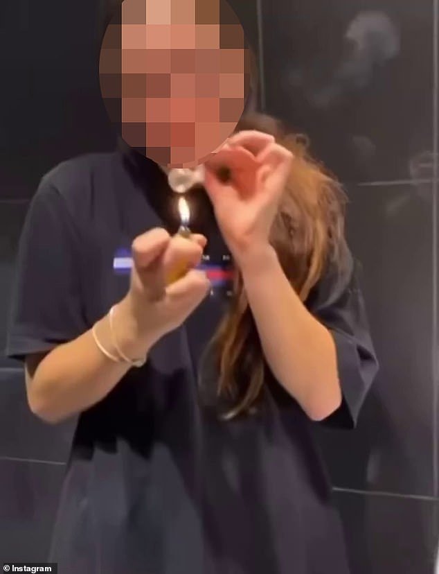 Other videos show teens using glass pipes to smoke methamphetamine in public bathrooms (pictured)