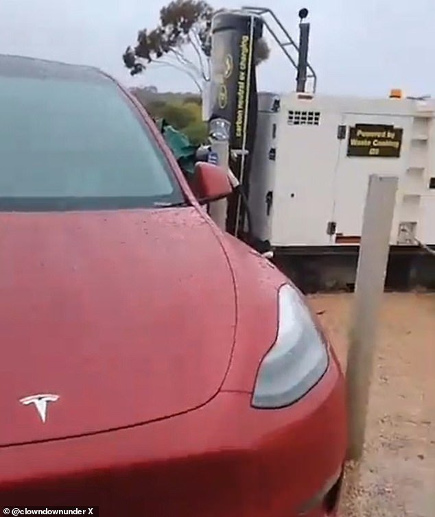 This photo of a Tesla being charged by what appears to be a diesel generator has sparked much scorn online