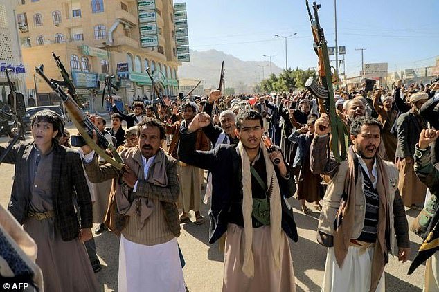 Armed protesters take part in a solidarity rally with Gaza in the rebel-held Yemeni capital Sanaa.  Antony Blinken warned of 'consequences' if rebels don't stop attacking ships in the Red Sea, calling on Iran to end its support for the rebels
