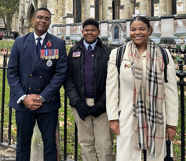 His money-making efforts – £4 per hour-long car wash – are supported by dad Patrick, pictured here in Westminster with Clark and his sister Scarlett