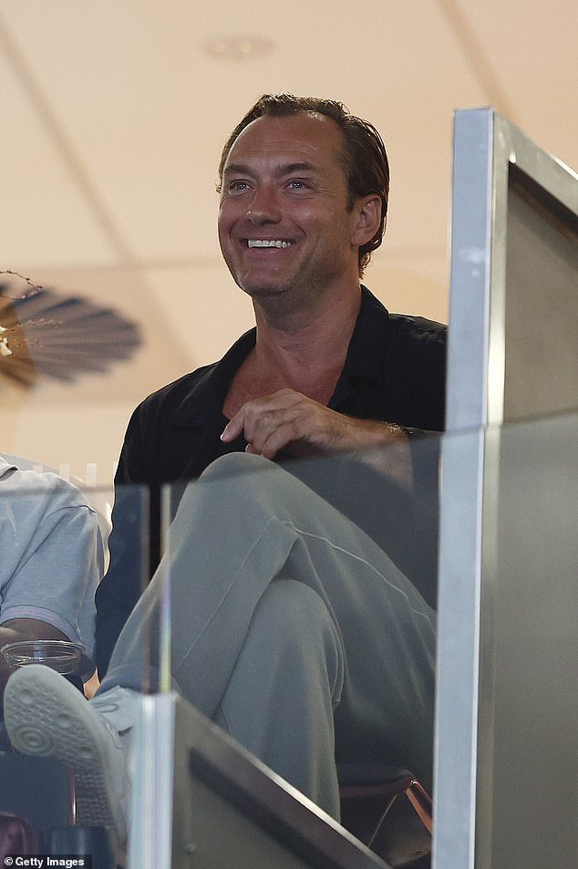 The world number 2 was left confused during her post-match interview when she was informed by Channel Nine correspondent Jelena Dokic that there was a British superstar among the faces in the stands - none other than Jude Law (pictured)
