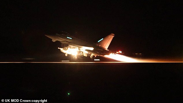 A British Typhoon aircraft takes off from Royal Air Force Base Akrotiri in Cyprus to take part in airstrikes in Houthi-controlled Yemen earlier this month.  The second series of joint strikes was launched on Monday