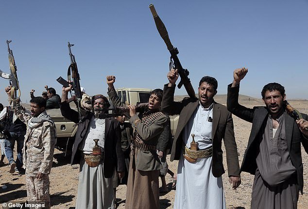 Houthi rebels are pictured at a tribal gathering near Sanaa, Yemen, on Monday