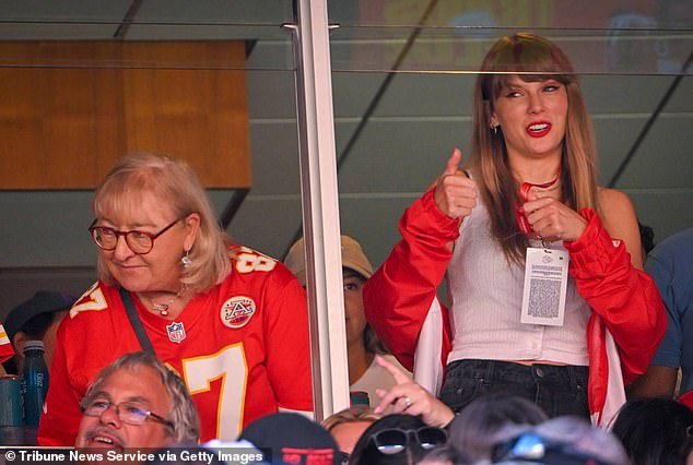 Swift was on hand to watch Travis in his September 24 game against the Chicago Bears, sitting next to Donna in a luxury box.