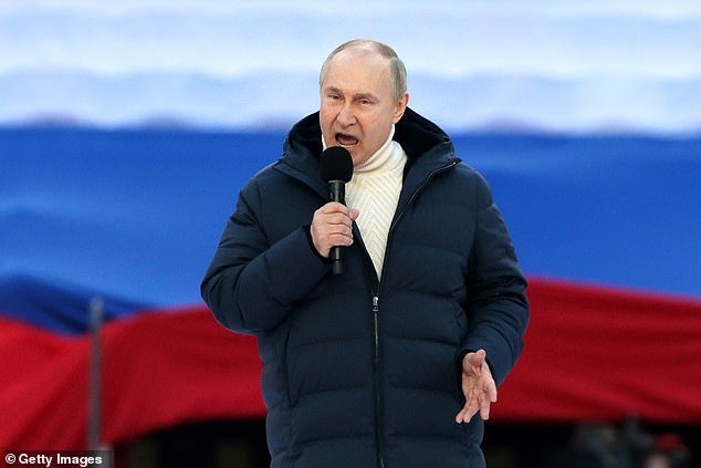 Russian President Vladimir Putin gives a speech in support of the war in Ukraine
