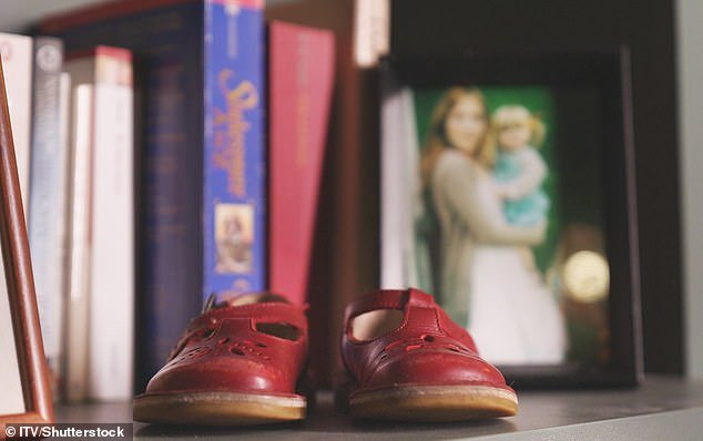 Watkins and his wife keep Maude's red shoes on the mantelpiece, 13 years after her death