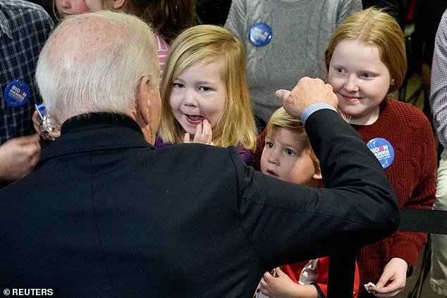 President Joe Biden speaks to children during the opening of the Biden for President campaign office in Wilmington