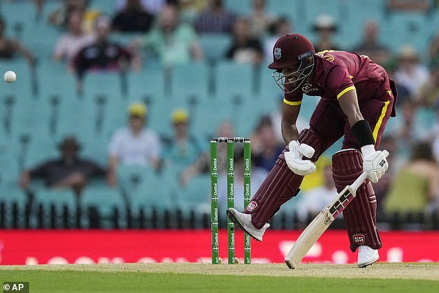 West Indies' Shai Hope fumbles off a delivery from Australia's Josh Hazlewood