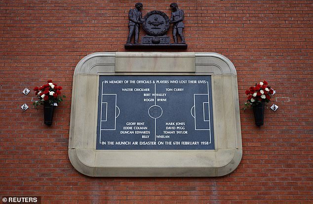 Supporters gathered outside the stadium for a fan-led service under the Munich plaque from 12:00 - 12:30 GMT