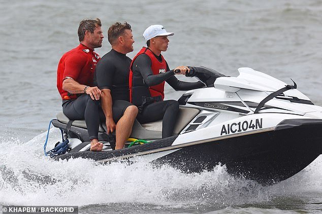 The pair were towed out to sea on a jet ski