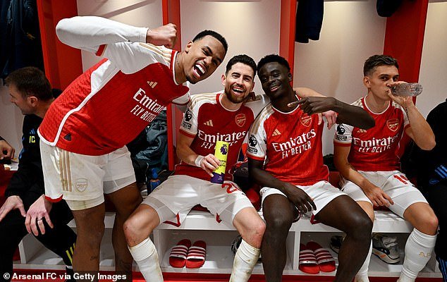The celebrations continued into the dressing room, with Arsenal now two points clear of Liverpool, who sit at the top of the Premier League