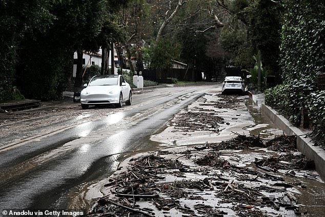 A view of the muddy road in the Beverly Crest neighborhood on Monday as atmospheric river storms hit Los Angeles, California