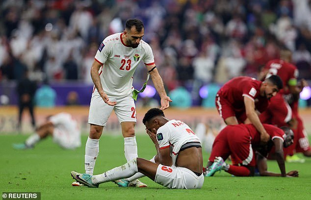 Jordan's players look disconsolate after losing their first-ever Asian Cup final