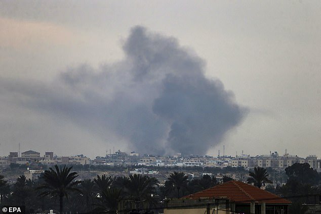 Smoke rises after an Israeli airstrike during a military operation in the town of Khan Younis, southern Gaza Strip