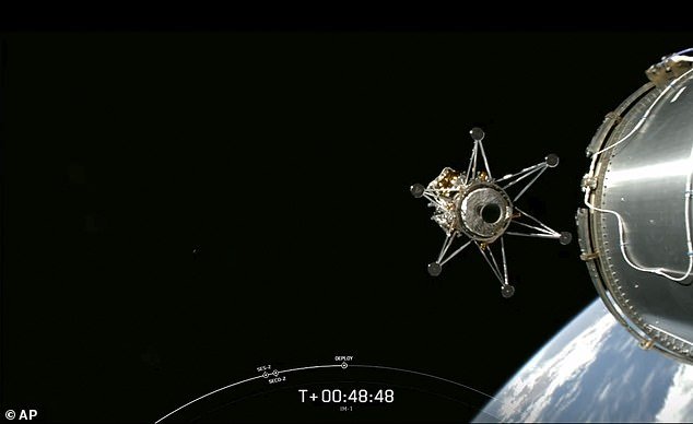 This image from a video from SpaceX via NASA TV shows the Intuitive Machines lunar lander detaching from the rocket's upper stage and heading for the moon