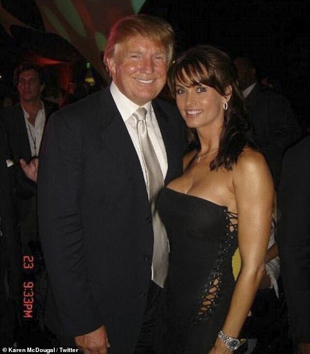 Prosecutors claim Trump's 2016 hush money payment to porn star Stormy Daniels (pictured with Trump) was an illegal campaign donation, allowing them to file misdemeanor charges instead of just a misdemeanor
