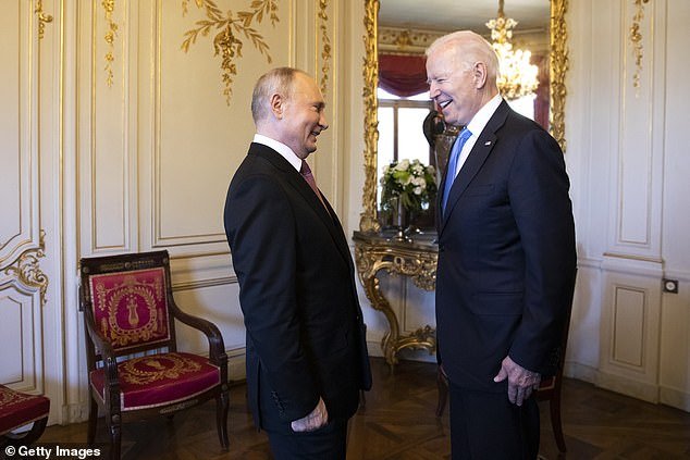 President Joe Biden (right) said he told Russian President Vladimir (left) during their June 2021 meeting that there would be 