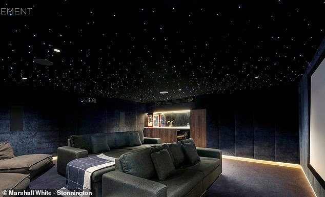 Another spectacular feature is the home theater (pictured) in the expansive property