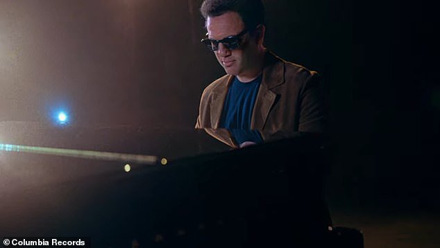 The Grammy Award-winning songwriter aged even further while performing the song's piano solo, and the singer progressed toward his current age while singing the song's final chorus.