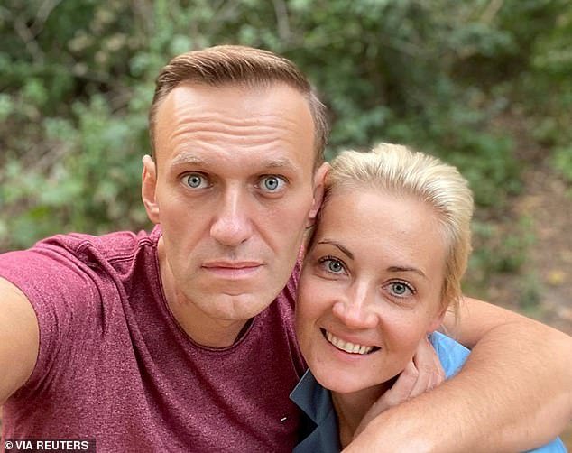 Russian opposition politician Navalny, together with his wife Yulia Navalnaya