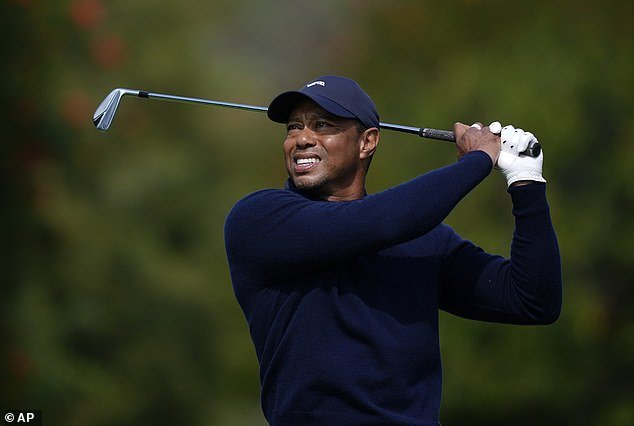 Woods appeared to be in visible discomfort on holes four and five on Friday afternoon