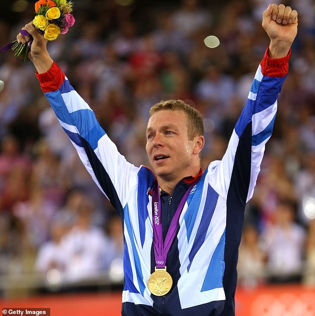 Sir Chris celebrates during the medal ceremony at the 2012 London Olympics