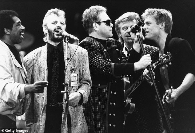 Bryan Adams, Elton John and Ringo Starr sing together during a concert for the Prince's Trust