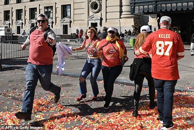 People flee after shots are fired near Kansas City Chiefs' Super Bowl LVIII victory parade