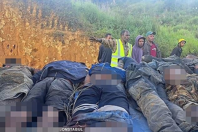 Bodies were placed on a flatbed truck after the brutal massacre in the PNG highlands