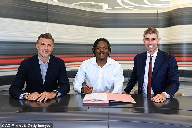He played a key role in the signing of star winger Rafael Leao (centre) from Lille