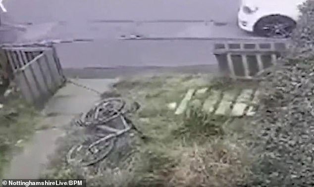 The driver is knocked out before returning to steal the bike