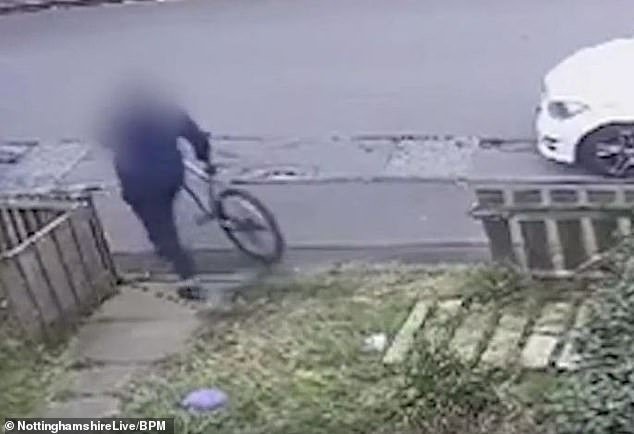 The thief calmly drives the bicycle back to his van