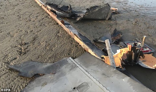 A photo made available by the Houthis media center shows the alleged debris of a US drone after it was shot down in the Red Sea port city
