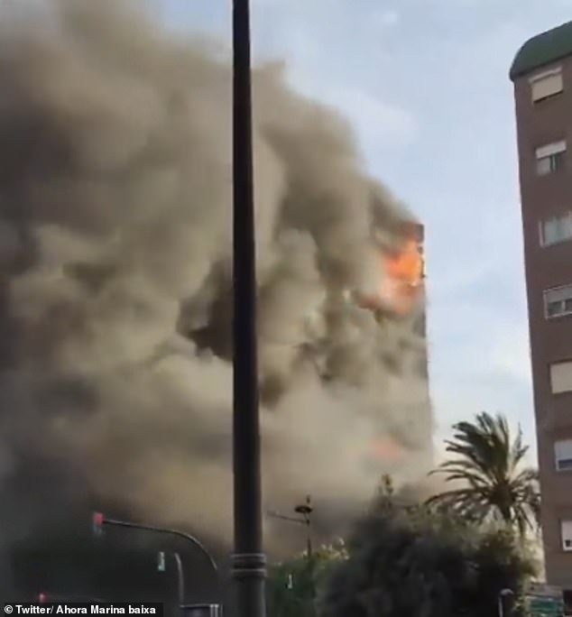 A cloud of black smoke completely enveloped the building on Thursday evening and flared up
