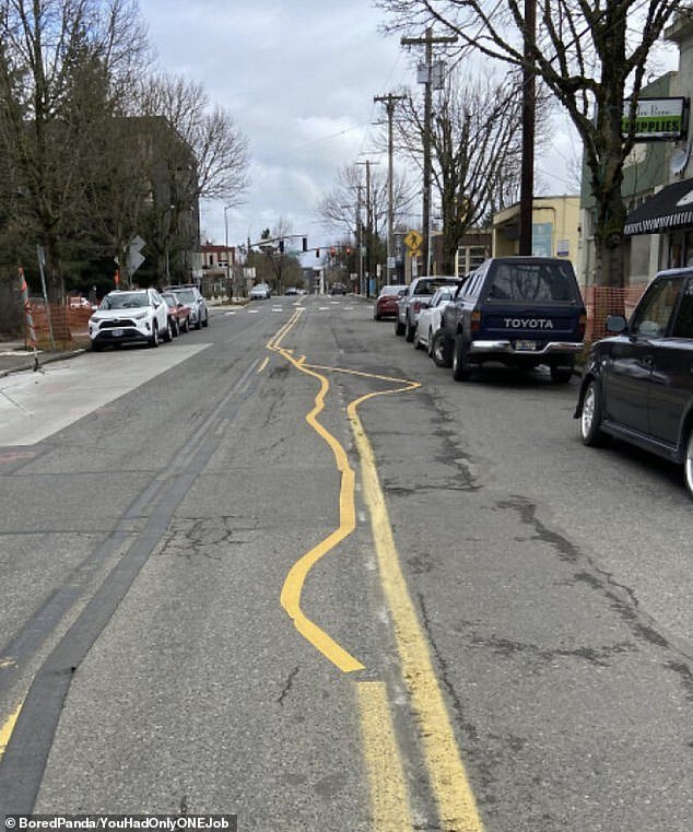 A road maintenance worker in the US was clearly having a terrible day after painting the yellow lines on a totally shaky road